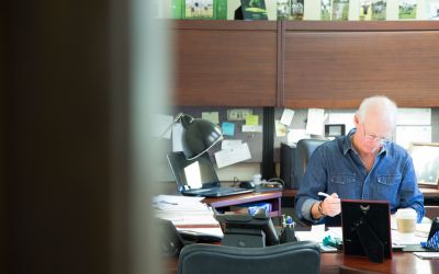 Brian O'Brien working at his desk