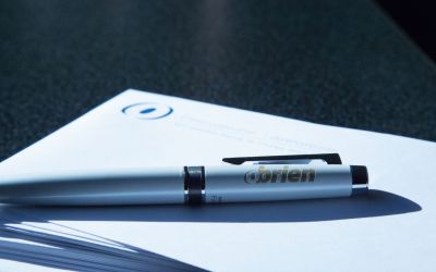 O'Brien pen sitting on top of a stack of O'Brien envelopes