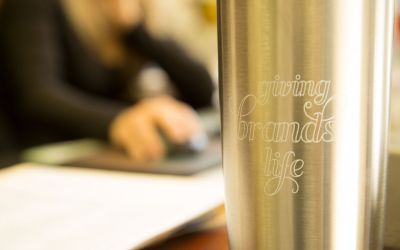 Close up of an O'Brien thermos with the O'Brien slogan Giving Brands Life